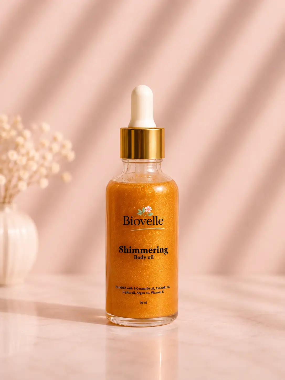 Shimmering dry body oil gold
